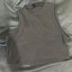 Small black shirt fits size MEDIUM